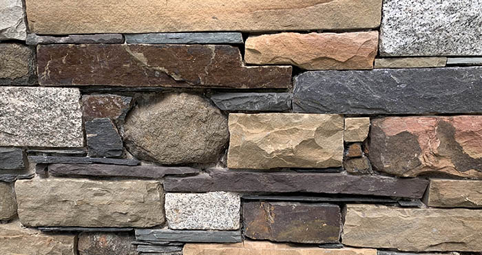 stone wall at the Blomquist south entrance